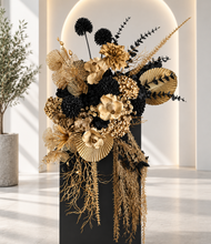 Load image into Gallery viewer, Black arch backdrop and black &amp; gold flowers - HIRE ONLY
