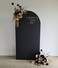 Load image into Gallery viewer, Black arch backdrop &amp; 2 x black &amp; gold flowers - HIRE ONLY
