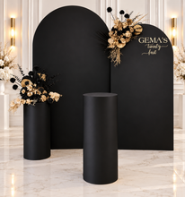 Load image into Gallery viewer, 2 x arch backdrop, 2 x black &amp; gold flowers, 2 x black plinths - HIRE ONLY
