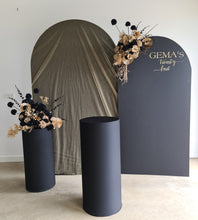 Load image into Gallery viewer, 2 x arch backdrop, 2 x black &amp; gold flowers, 2 x black plinths - HIRE ONLY
