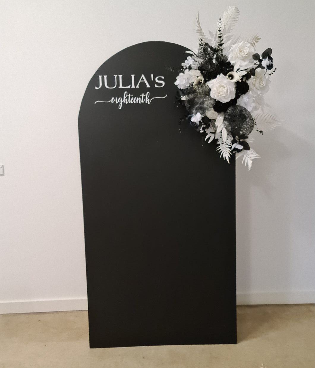 Black arch / backdrop and black & white flowers - HIRE ONLY