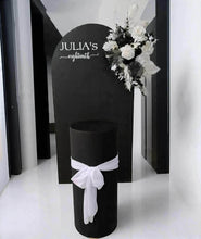 Load image into Gallery viewer, Black arch backdrop, Black &amp; white flowers and black plinth / cake stand - HIRE ONLY
