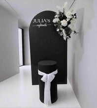 Load image into Gallery viewer, Black arch backdrop, Black &amp; white flowers and black plinth / cake stand - HIRE ONLY
