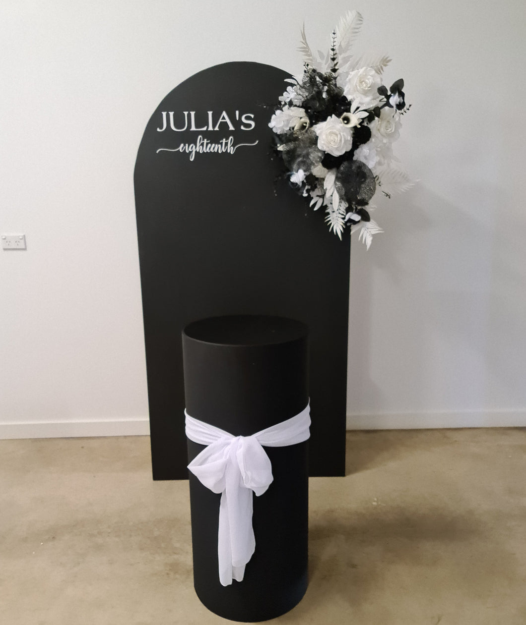 Black arch backdrop, Black & white flowers and black plinth / cake stand - HIRE ONLY