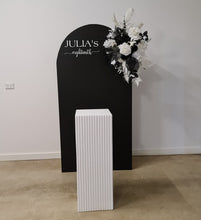 Load image into Gallery viewer, Black arch backdrop, Black &amp; white flowers and white square ripple plinth / cake stand - HIRE ONLY
