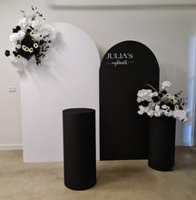 Load image into Gallery viewer, 2 x arch backdrop (black &amp; white), 2 x black &amp; white flowers, 2 x cylinder plinths - HIRE ONLY
