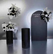 Load image into Gallery viewer, 2 x arch backdrop (black &amp; white), 3 x black &amp; white flowers, 2 x cylinder plinths - HIRE ONLY
