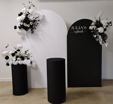 Load image into Gallery viewer, 2 x arch backdrop (black &amp; white), 3 x black &amp; white flowers, 2 x cylinder plinths - HIRE ONLY
