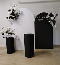 Load image into Gallery viewer, 2 x arch backdrop (black &amp; white), 3 x black &amp; white flowers, 2 x cylinder plinths - HIRE ONLY
