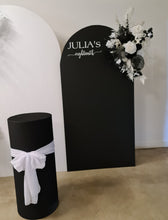Load image into Gallery viewer, 2 x arch backdrop (black &amp; white), 3 x black &amp; white flowers, 2 x cylinder plinths - HIRE ONLY
