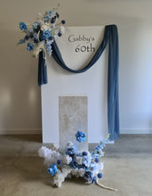 Load image into Gallery viewer, White rectangular backdrop 2.1m, 2 x blue flowers &amp; cake stand - HIRE ONLY
