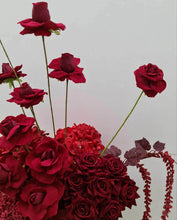 Load image into Gallery viewer, Burgundy floor / plinth flowers in white ribbed pot - HIRE OLY
