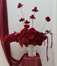 Load image into Gallery viewer, Burgundy floor / plinth flowers in white ribbed pot - HIRE OLY
