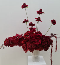 Load image into Gallery viewer, Burgundy floor / plinth flowers in white ribbed pot - HIRE OLY
