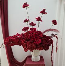 Load image into Gallery viewer, Burgundy floor / plinth flowers in white ribbed pot - HIRE OLY
