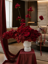 Load image into Gallery viewer, Burgundy floor / plinth flowers in white ribbed pot - HIRE OLY
