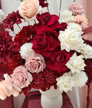 Load image into Gallery viewer, Burgundy, pink &amp; white floor / plinth flowers in white ribbed pot - HIRE ONLY
