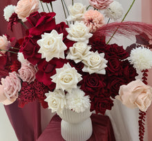 Load image into Gallery viewer, Burgundy, pink &amp; white floor / plinth flowers in white ribbed pot - HIRE ONLY
