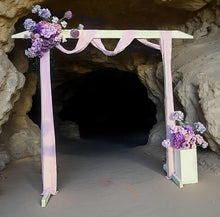 Load image into Gallery viewer, White wood arbour &amp; 2 x purple / violet flowers - HIRE ONLY
