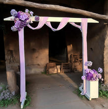 Load image into Gallery viewer, White wood arbour &amp; 2 x purple / violet flowers - HIRE ONLY

