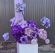 Load image into Gallery viewer, White wood arbour &amp; 2 x purple / violet flowers - HIRE ONLY
