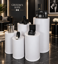 Load image into Gallery viewer, Grooms Preparation Room - Set of 5 White leather look Cylinder Plinths - HIRE ONLY
