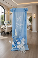 Load image into Gallery viewer, Oh Baby Blue &amp; White Fabric Welcome Sign &amp; Flower Arrangement - HIRE ONLY

