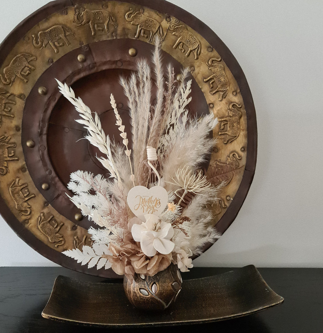 Preserved everlasting Mother's Day flowers in unique pot with tray