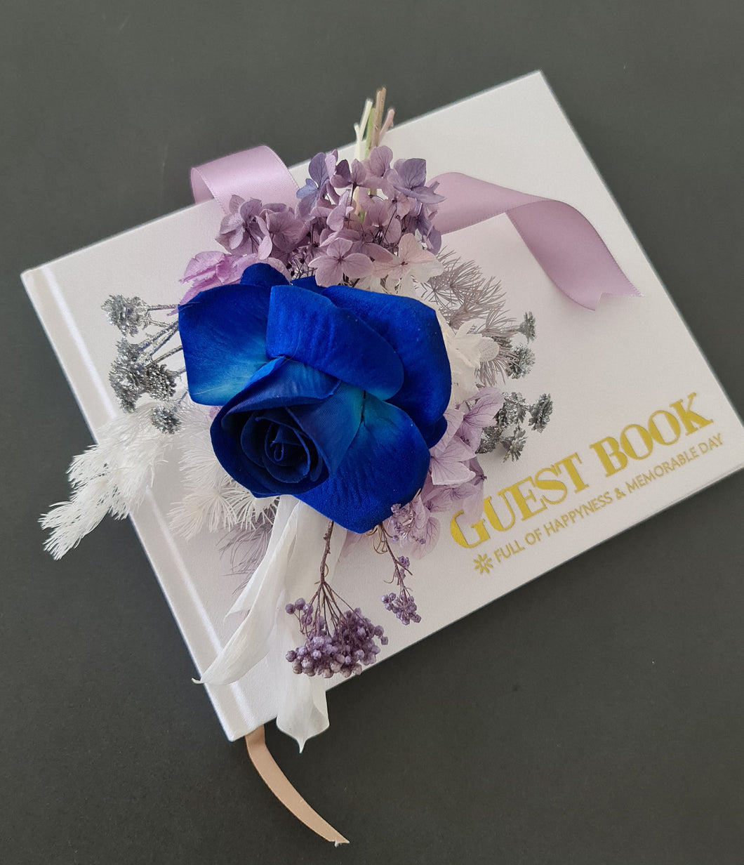 Wedding guest book flowers in purple & blue