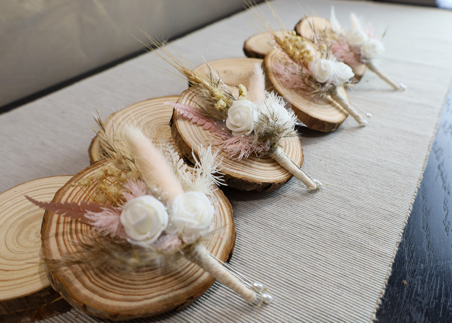 X - Blush buttonholes with latex roses